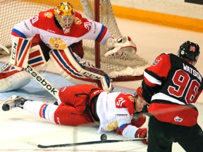 Team Russia's Dmitrii Sergeev makes a sliding block on a shot by Team OHL’s Spencer Watson during first-period action in a CHL Canada Russia Series game in Owen Sound on Nov. 12. Watson scored twice in Team OHL’s 3-0 win. (James Masters/Postmedia Network)