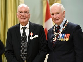 Kenneth Baird is invested as a Member of the Order of Canada by Governor General David Johnston at Rideau Hall in Ottawa, on Wednesday, Nov. 18, 2015. THE CANADIAN PRESS/Justin Tang