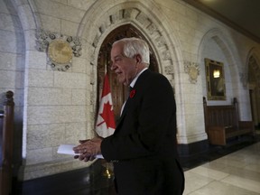 Canada's Immigration Minister John McCallum leaves at the conclusion of a news conference on Parliament Hill in Ottawa, Canada November 9, 2015. REUTERS/Chris Wattie