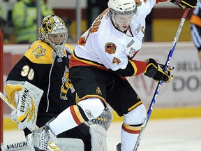 Former Belleville Bulls captain Luke Judson applies a screen during a game against the arch-rival Kingston Frontenacs. Judson left Belleville in 2012 as one of only two three-year captains in franchise history. (Aaron Bell/OHL Images)