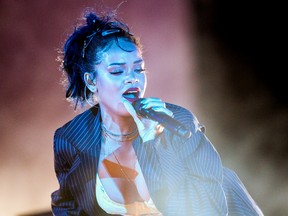 Rihanna performs at the We Can Survive Concert at the Hollywood Bowl on Saturday, Oct. 24, 2015, in Los Angeles. (Rich Fury/Invision/AP)