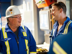 Beaver Drilling CEO Brian Krausert speaks with an employee.
Krausert tells Sun columnist Rick Bell the provincial government hasn’t instilled investor confidence in the energy sector.
Photo provided.