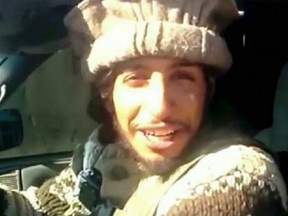 This undated image taken from a militant website on Monday, Nov. 16, 2015, shows Belgian Abdelhamid Abaaoud. Abaaoud the Belgian jihadi suspected of masterminding deadly attacks in Paris was killed in a police raid on a suburban apartment building, the city prosecutor's office announced on Nov. 19, 2015. (Militant video via AP)