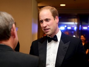 Prince William, Duke of Cambridge (R) meets charity representatives as he attends The Cinema and Television Benevolent Fund's Royal Film Performance 2015 of the new James Bond 007 film "Spectre" at Royal Albert Hall on October 26, 2015 in London, England.  REUTERS/Chris Jackson/Pool