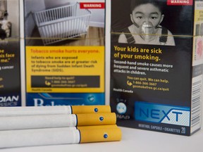 Cigarettes are displayed with a new squeezable menthol capsule inside the filter in Toronto on Wednesday, November 18, 2015. A health organization is concerned a new type of cigarette being introduced to the Canadian market may hook more teens and young adults on tobacco. (THE CANADIAN PRESS/Nathan Denette)