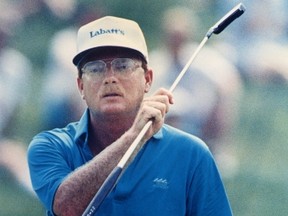 Dan Halldorson of Brandon, Manitoba tries to coax in a putt on the 16th gren during third round play of the Canadian Open at Glen Abbey in Oakville, Saturday, June 24, 1989. Halldorson, a Canadian Golf Hall of Famer who enjoyed a long career on the PGA Tour, has died.THE CANADIAN PRESS/Hans Deryk