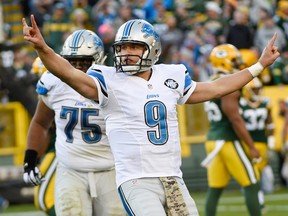 Detroit Lions quarterback Matthew Stafford (9) reacts after throwing a touchdown pass in the fourth quarter during the game against the Green Bay Packers at Lambeau Field. The Lions beat the Packers 18-16. Benny Sieu-USA TODAY Sports