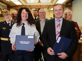 Canada Post mail carrier Lorie Wood and Belleville Police Cst. Dan Joly were just some of the people recognized at the Police Services Board meeting, on Thursday.