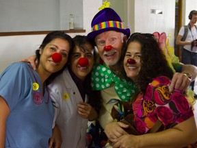 Kingston, Ont.  psychologist Dr. Ron Warner poses with medical staff from Guatemala during a visit he made there to learn about humanitarian clowning. Supplied photo by Paul Patrin /Postmedia Network