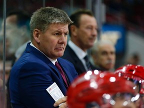 Carolina Hurricanes head coach Bill Peters looks on from the bench against the  Dallas Stars at PNC Arena. The Dallas Stars defeated the Carolina Hurricanes 4-1. James Guillory-USA TODAY Sports