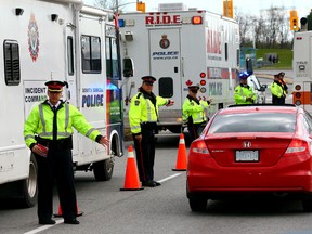 OPP, Toronto Police and other Ontario Regional forces join to kick off the annual Ride program ahead of the holiday season near Humber College in Toronto on Nov. 19, 2015. (Dave Abel/Toronto Sun)