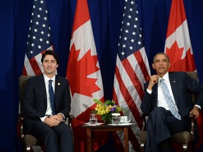 Canadian Prime Minister Justin Trudeau, left, takes part in a bilateral meeting with U.S. President Barack Obama at the APEC Summit in Manila, Philippines on Thursday, November 19, 2015. THE CANADIAN PRESS/Sean Kilpatrick