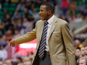 Toronto Raptors head coach Dwane Casey directs his team in first quarter against the Utah Jazz at EnergySolutions Arena. (Jeff Swinger/USA TODAY Sports)