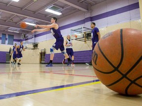 The Western Mustangs men?s basketball team runs through drills during a practice at Thames Hall this week. The team?s five years of growing experience has made it competitive with the top 10 teams in the country. (CRAIG GLOVER, The London Free Press)