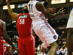 Raptors 905’s Lucas (Bebe) Nogueira misses on a shot against the Maine Red Claws in the 905’s inaugural home game at the Hershey Centre in Mississauga last night. (Stan Behal/Toronto Sun)