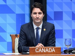 Prime Minister Justin Trudeau takes part in a plenary session at the APEC Summit in Manila, Philippines on Thursday, Nov. 19, 2015. THE CANADIAN PRESS/Sean Kilpatrick