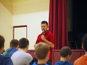 MADD representative Neil Cowan speaks to the Grade 7-8 at St. James Catholic School November 19.(Shaun Gregory/Huron Expositor)