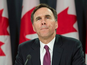 Finance Minister Bill Morneau speaks to media as he delivers a fiscal update during a news conference, in Ottawa, on Friday, Nov. 20, 2015. THE CANADIAN PRESS/Adrian Wyld