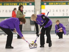 Alison Taylor watches her shot as Scottish teammates Elizabeth Shaw and Fiona Macfarlane sweep at the Idylwylde on Wednesday. The team hails from the Dumfries Curling Club in Scotland. The Idylwylde Golf & Country Club played host to the Scottish Lady Curlers Tour of Canada 2015 in Sudbury, Ont., on Wednesday, with 24 curlers from Scotland who are taking part in an  18-day tour in which 23 friendly games will be played against Canadian teams  at various clubs in Quebec and Ontario.