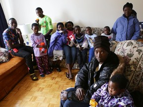 Burundi refugees Ramadhani Madaraka and Alphonsine Ntriganiza and their nine children arrived in Kingston on Thursday, Nov. 19, 2015 after spending 15 years in a refugee camp in Tanzania. The family's migration to Kingston was sponsored by the St. Mary’s Refugee Sponsorship Committee.
Elliot Ferguson/The Whig-Standard/Postmedia Network