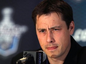 Former Tampa Bay Lightning coach Guy Boucher in 2011. Boucher will return to coach Canada's team at the Spengler Cup, a month after he was fired by his Swiss league team. (THE CANADIAN PRESS/AP-Charles Krupa)