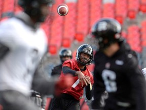 Ottawa Redblacks quarterback Henry Burris throws the ball during practice in Ottawa on Friday, Nov. 20, 2015. The Redblacks will play the Hamilton Tigercats in the CFL Eastern Final on Sunday. THE CANADIAN PRESS/Justin Tang