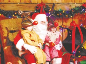 Santa holds court inside his workshop in Ingersoll. (Special to Postmedia News)