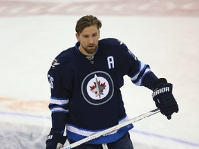 Nov 18, 2015; Winnipeg, Manitoba, CAN; Winnipeg Jets forward Blake Wheeler (26) prior to the game against the Vancouver Canucks at MTS Centre.