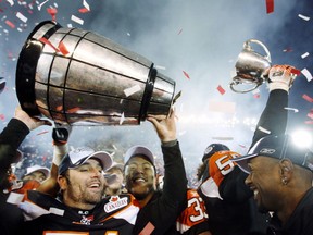B.C. Lions players celebrate with the Grey Cup, in two pieces, after beating the Montreal Alouettes to win the Canadian Football League’s 94th Grey Cup on November 19, 2006 in Winnipeg.