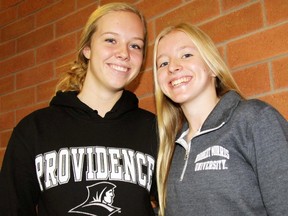 Neve Van Pelt (left), of Mitchell, and Lexi Templeman, of Staffa, have both accepted U.S. scholarships to play college hockey in the future. The pair are students at St. Michael Catholic Secondary School in Stratford. CORY SMITH/POSTMEDIA NETWORK