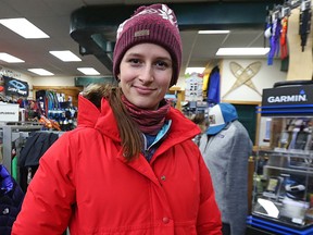 Buffy Cowtan, an equipment expert at Wilderness Supply, models winter wear in their Ferry Road store on Wed., Nov. 18, 2015. For Grey Cup supplement. Kevin King/Winnipeg Sun/Postmedia Network