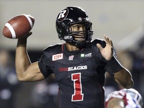 Ottawa Redblacks quarterback Henry Burris throws the ball against the Montreal Alouettes during the first half of their CFL football game in Ottawa, Canada October 1, 2015. REUTERS/Chris Wattie