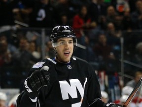 Islanders defenceman Travis Hamonic has asked to be traded to a Western Canadian team for personal reasons. The Isles want something equal, or better, in return and are in no hurry to deal him. (AP Photo/Paul Bereswill)