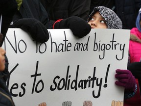 Several hundred people took part in a rally against Islamophobia at Valley Park Middle School in Thorncliffe Park and marched up Don Mills Rd. to Grenoble Public School, where a Muslim woman was attacked earlier this week. (Michael Peake/Toronto Sun/Postmedia Network)
