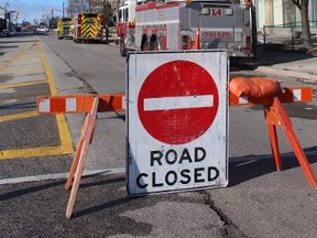 Sarnia police kept a section of George Street closed off between Front and Vidal streets following a three-alarm fire at the Kenwick Place early Sunday morning. Barbara Simpson/Sarnia Observer/Postmedia Network