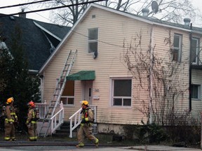 Kingston Fire and Rescue respond to a structure fire in an upstairs apartment of a home in the 100 block of Joseph Street in Kingston, Ont. on Saturday November 21, 2015. No injuries were reported. Steph Crosier/Kingston Whig-Standard/Postmedia Network
