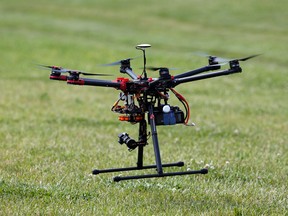In this photo taken June 11, 2015, a hexacopter drone is flown during a demonstration in Cordova, Md. (AP PHOTO)