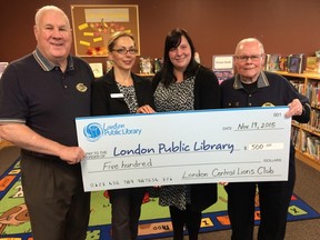 The London Central Lions Club donated $500, money raised through barbecue sales, to the London Public Library. The money will assist the library with its READ and summer literacy programs. Left to right: Walt Grieve, 2nd VP, London Central Lions Club, Frances Cutt, Literacy and READ Program Facilitator, London Public Library, Councillor Virginia Ridley, and Grant Brown, President, London Central Lions Club