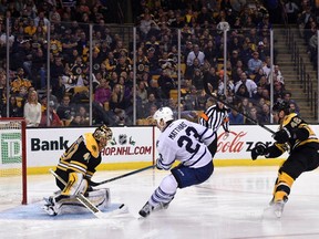 Boston Bruins goalie Tuukka Rask makes a save on Toronto Maple Leafs centre Shawn Matthias during the third period at TD Garden. (BOB DeCHIARA/USA TODAY Sports)