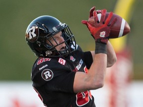 Redblacks wide receiver Greg Ellingson catches a pass which he ran for the game winning touchdown against the Hamilton Tiger-Cats in the CFL East Division final in Ottawa on Sunday, November 22, 2015. 
THE CANADIAN PRESS/Adrian Wyld