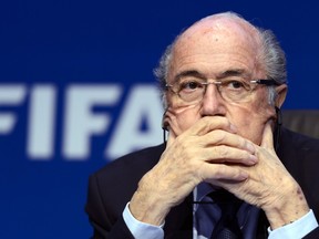 A file photo taken on May 30, 2015 shows FIFA president Sepp Blatter attending a press conference in Zurich after being re-elected during the FIFA Congress. The FIFA ethics committee probing allegations of corruption against suspended president Sepp Blatter and his would-be successor, Michel Platini, has requested that sanctions be levelled against both men, a statement said on November 21, 2015.  AFP PHOTO / FABRICE COFFRINI