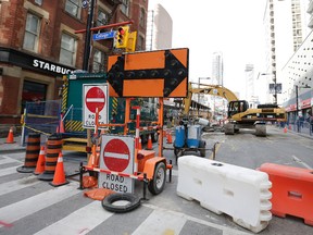 Yonge St. closed both ways from College to Alexander Sts. on Monday, November 23, 2015 due to a sinkhole. (Craig Robertson/Toronto Sun)