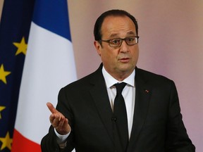 France's President Francois Hollande leaves a news conference on climate change for agricultural sector before the upcoming COP21 World Climate Summit at the Elysee Palace in Paris, November 20, 2015. The conference of the 2015 United Nations Framework Convention on Climate Change (COP21) will start on November 30, 2015.  REUTERS/Michel Euler/Pool