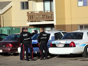 Police investigates a suspicious death at a apartment on 134 ave and 49 st in Edmonton, Alberta on November 22, 2015.  Perry Mah/Edmonton Sun