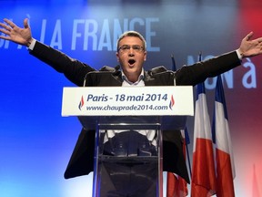 This photo taken on May 18, 2014 shows the head of French far-right party Front National (FN) candidate for the European elections for Paris' area constituency, Aymeric Chauprade, delivering a speech during a campaign meeting in Paris. Dominican Republic authorities said on November 22, 2015 they had issued arrest warrants for three Frenchmen including Chauprade, accused of helping the escape from the country of two French pilots sentenced to prison on cocaine trafficking charges. AFP PHOTO / FILES / PIERRE ANDRIEU