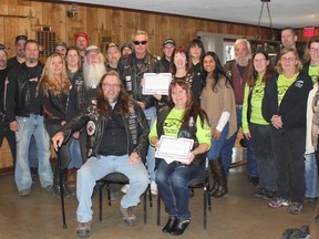The Association of Bikers for Awareness, Training and Education presented Anita Shah of Childcan with $1,650 last Saturday. Presenting the cheque were Cuzman and Kimmer, along with Claude Jones (promotional rep for Ontario) and Lake Huron Steel Horse Riders president, Brenda Brown. (Laura Broadley/Clinton News Record)