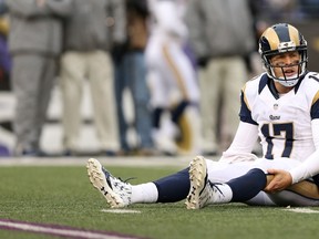 Quarterback Case Keenum of the St. Louis Rams sits on the turf during a game against the Baltimore Ravens at M&T Bank Stadium on November 22, 2015 in Baltimore. (Patrick Smith/Getty Images/AFP)