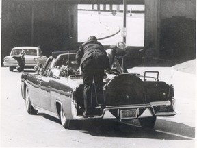 A series of frames from a home movie shot by Abraham Zapruder shows U.S. President John F. Kennedy jerking as an assassin's bullets strike him during a motorcade through downtown Dallas on Nov. 22, 1963. (File photo)