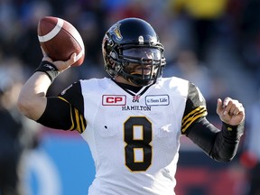 Hamilton Tiger-Cats' quarterback Jeremiah Masoli throws the ball against the Ottawa Redblacks during the first half of their CFL eastern final football game in Ottawa, Canada, November 22, 2015. REUTERS/Chris Wattie