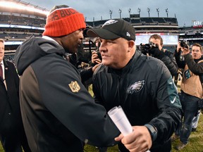 Tampa Bay Buccaneers head coach Lovie Smith and Philadelphia Eagles head coach Chip Kelly meet on field after game at Lincoln Financial Field. The Buccaneers defeated the Eagles, 45-17. Eric Hartline-USA TODAY Sports